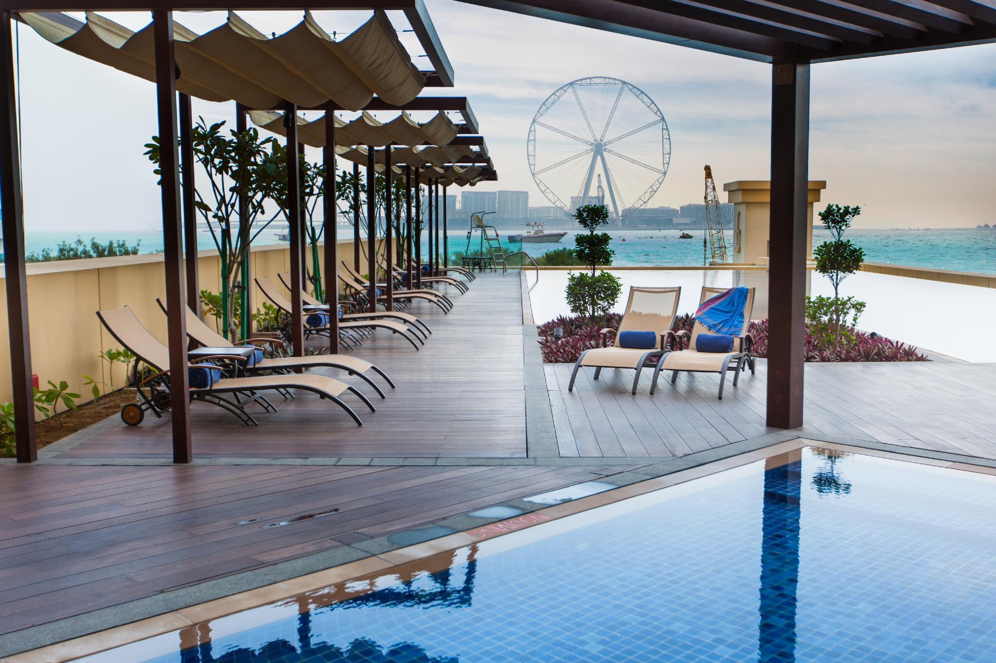 Ja Ocean View Hotel, Jumeirah Beach Dubai Exterior foto The swimming pool at the hotel