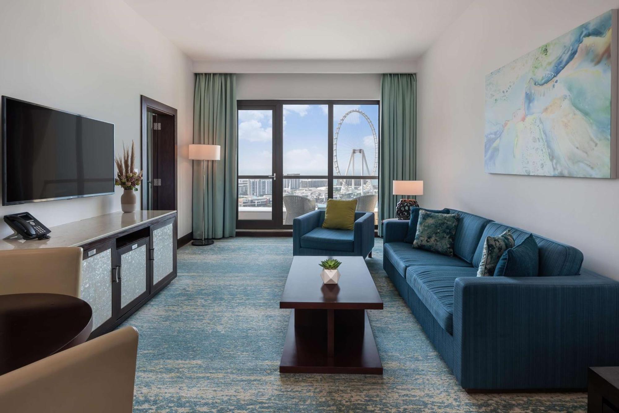 Ja Ocean View Hotel, Jumeirah Beach Dubai Exterior foto A living room at the Four Seasons